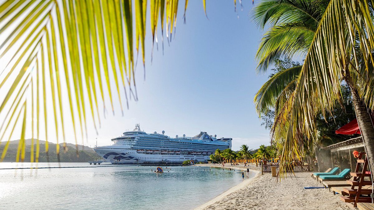 cruise ship by carribean beach